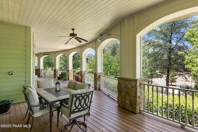 2469 W Post Oak Dr, Prescott, AZ 86305 - wooden porch featuring a ceiling fan and outdoor dining area