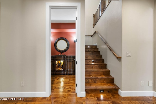 2469 W Post Oak Dr, Prescott, AZ 86305 - staircase featuring wood finished floors and baseboards