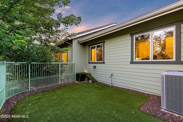 2469 W Post Oak Dr, Prescott, AZ 86305 - property exterior at dusk featuring a central AC unit