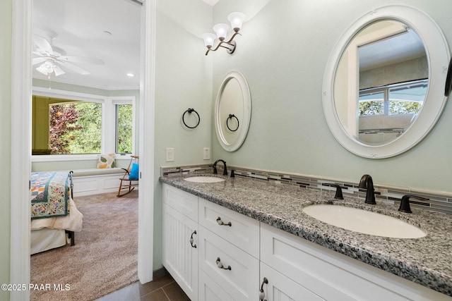 2469 W Post Oak Dr, Prescott, AZ 86305 - bathroom featuring double vanity, plenty of natural light, a ceiling fan, and ornamental molding