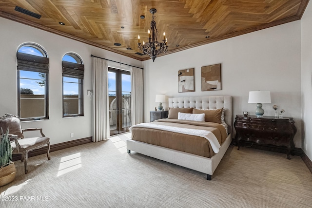 bedroom with access to outside, ornamental molding, wood ceiling, and an inviting chandelier