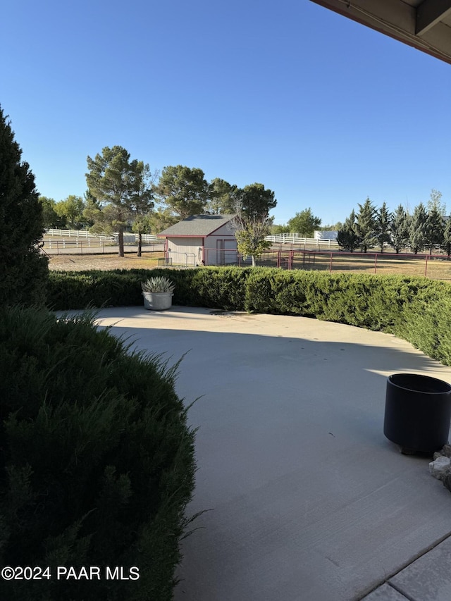 view of patio / terrace with a rural view