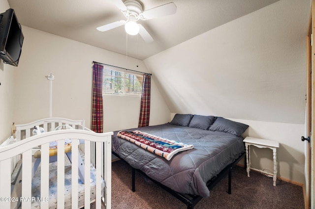 carpeted bedroom featuring ceiling fan and lofted ceiling