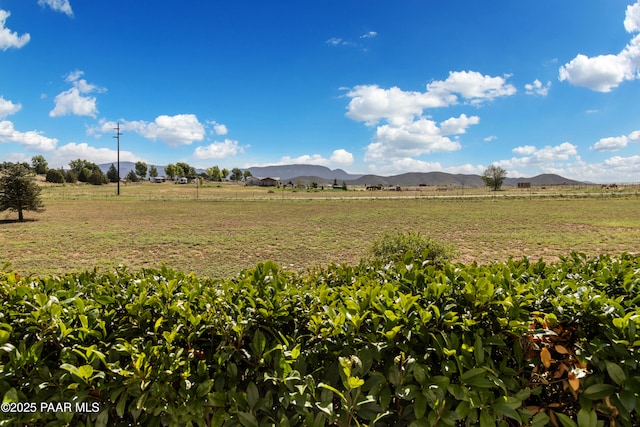 view of mountain feature featuring a rural view
