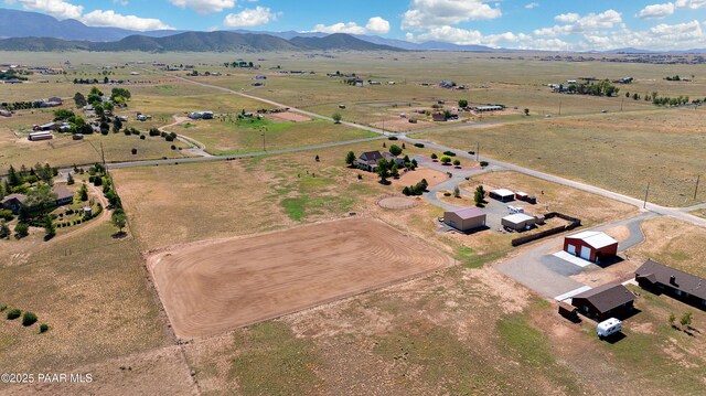 bird's eye view featuring a mountain view and a rural view