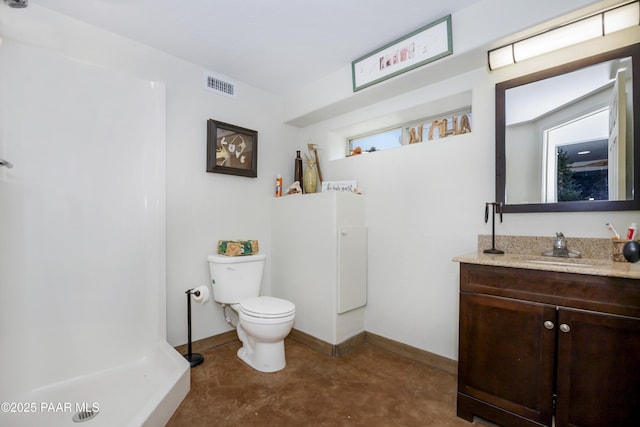 1101 S Milton Ave, Prescott, AZ 86303 - bathroom with concrete flooring, toilet, vanity, a shower, and baseboards