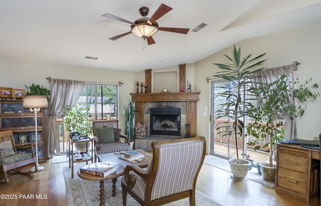 1101 S Milton Ave, Prescott, AZ 86303 - living area with a fireplace, wood finished floors, lofted ceiling, and ceiling fan