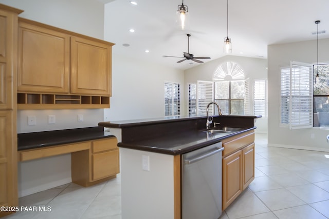 kitchen with stainless steel dishwasher, visible vents, dark countertops, a sink, and vaulted ceiling
