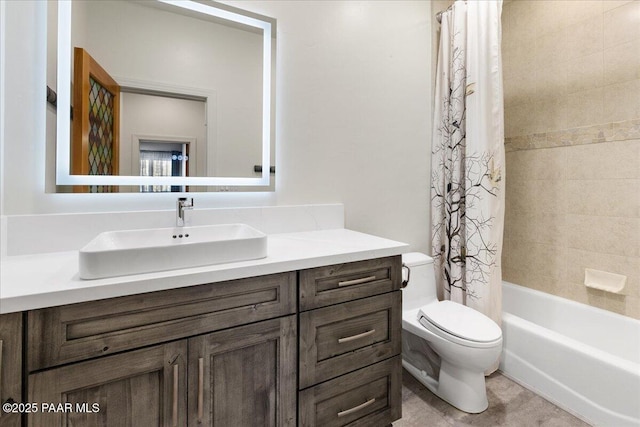 full bath featuring toilet, vanity, and shower / bathtub combination with curtain