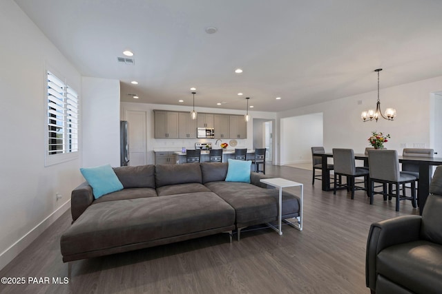 5083 N Kingsley Ct, Prescott Valley, AZ 86314 - living area featuring dark wood-style floors, a chandelier, and recessed lighting