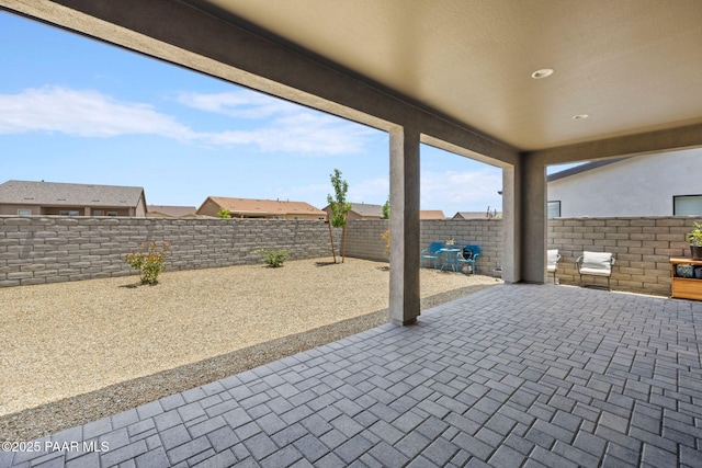 5083 N Kingsley Ct, Prescott Valley, AZ 86314 - fenced backyard with a patio area