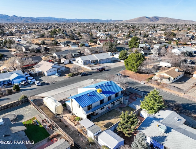 bird's eye view with a residential view and a mountain view