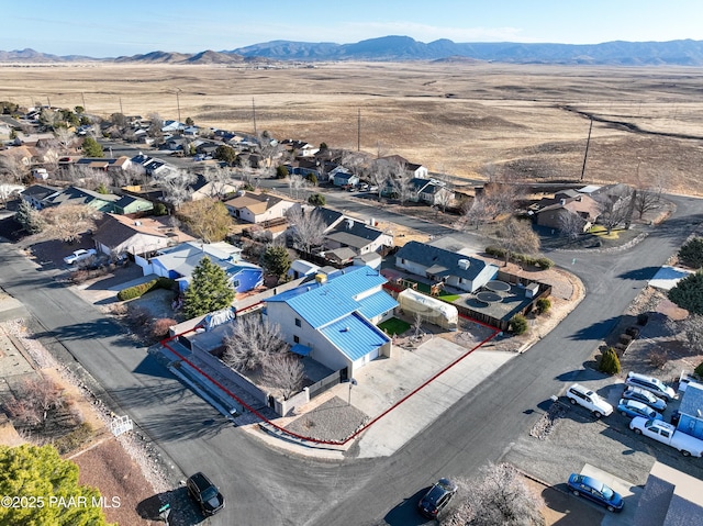 birds eye view of property featuring a residential view and a mountain view