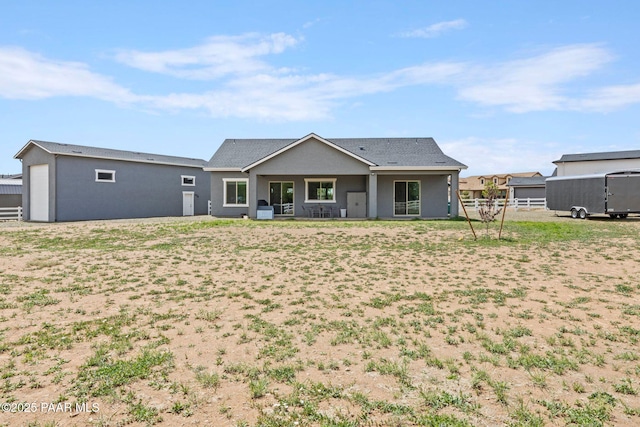 1450 Henry Dr, Chino Valley, AZ 86323 - back of property with fence and stucco siding
