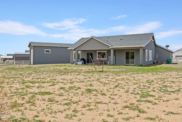 1450 Henry Dr, Chino Valley, AZ 86323 - back of house featuring stucco siding and fence