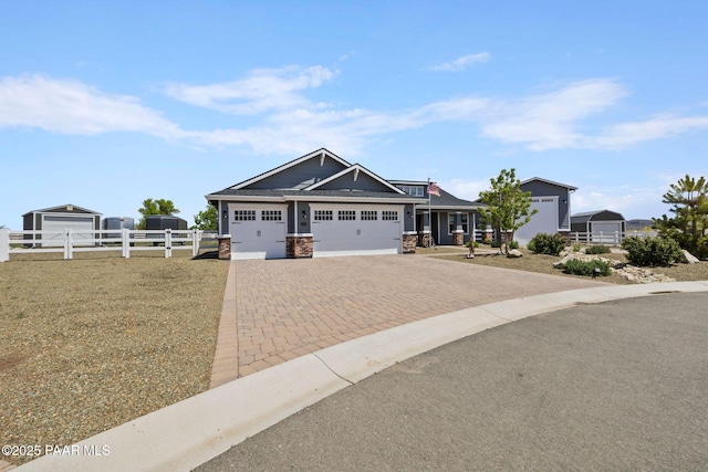 1450 Henry Dr, Chino Valley, AZ 86323 - view of front facade with a garage, fence, and decorative driveway