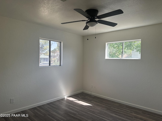 2532 Huron St, Dewey-Humboldt, AZ 86329 - empty room featuring dark wood-style floors, ceiling fan, and a textured ceiling