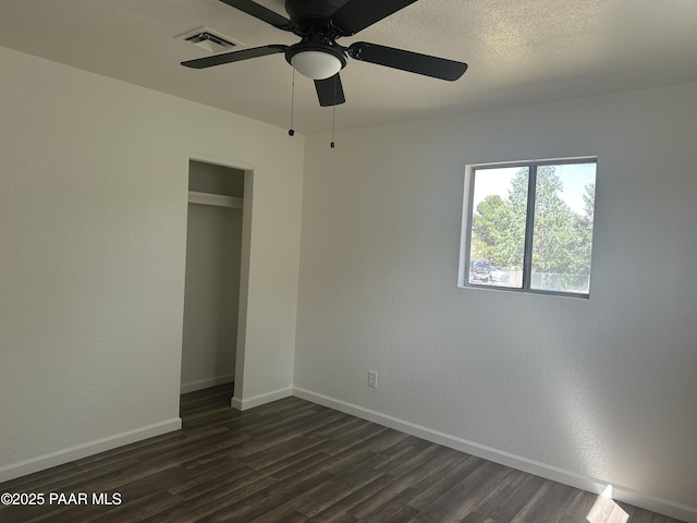 2532 Huron St, Dewey-Humboldt, AZ 86329 - unfurnished bedroom featuring dark wood-style floors and ceiling fan