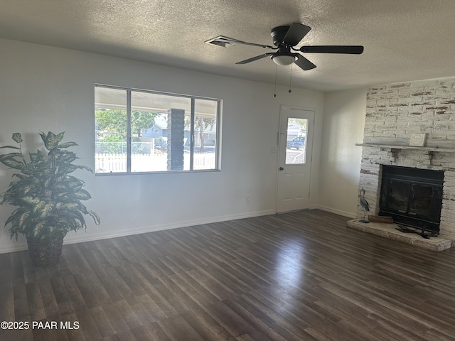 2532 Huron St, Dewey-Humboldt, AZ 86329 - unfurnished living room with a textured ceiling, wood finished floors, and ceiling fan