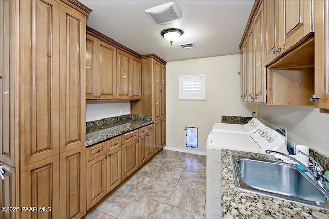 2770 Azurite St, Dewey-Humboldt, AZ 86327 - clothes washing area featuring cabinet space, separate washer and dryer, and baseboards