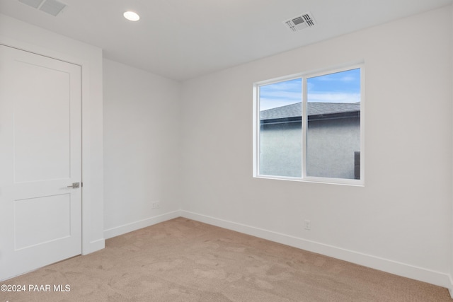 empty room with light carpet