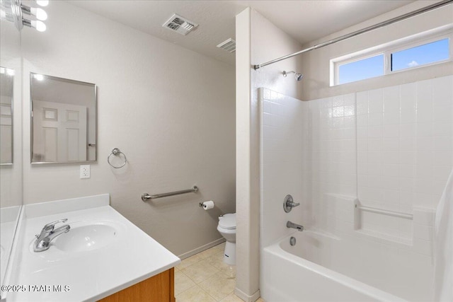 full bathroom featuring vanity, shower / bathing tub combination, tile patterned floors, and toilet