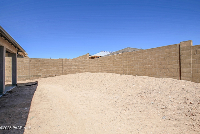 view of yard featuring a fenced backyard