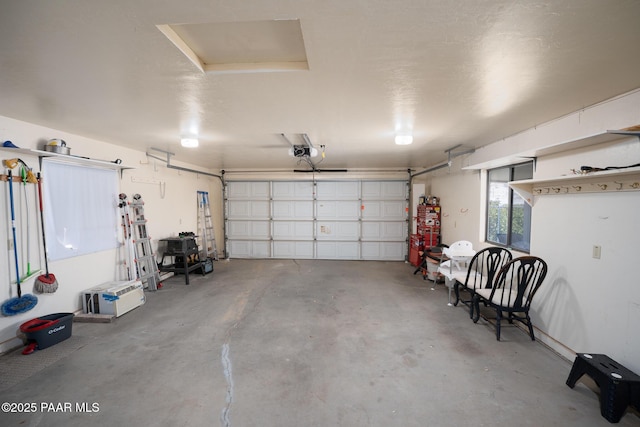 17571 E Hummingbird Ln, Mayer, AZ 86333 - garage featuring a garage door opener