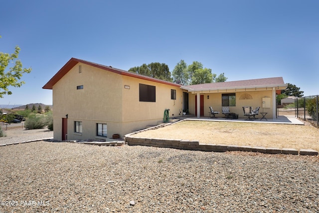 17571 E Hummingbird Ln, Mayer, AZ 86333 - back of property featuring a patio area, stucco siding, and a gate