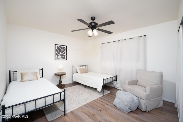 17571 E Hummingbird Ln, Mayer, AZ 86333 - bedroom featuring wood finished floors, baseboards, and ceiling fan