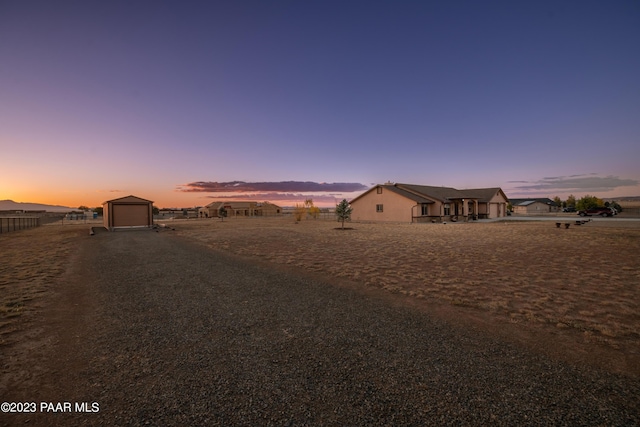 exterior space with a garage and an outdoor structure