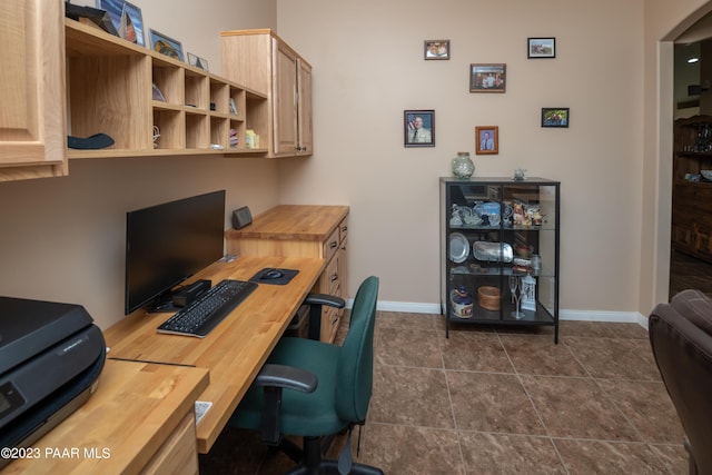 tiled office space with built in desk