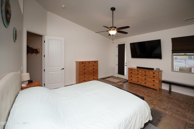 bedroom featuring ceiling fan and vaulted ceiling