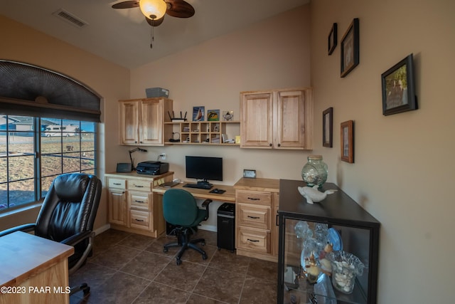 tiled office featuring ceiling fan and vaulted ceiling