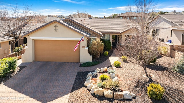 single story home featuring a garage