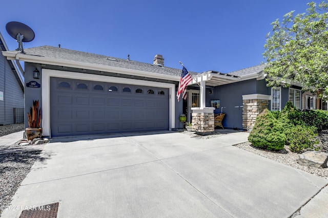 single story home featuring a garage