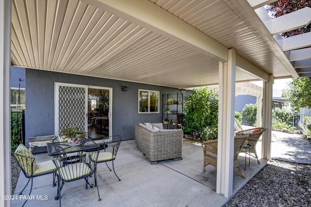 view of patio with an outdoor living space