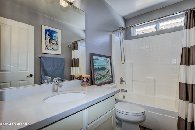 full bathroom with shower / bath combination with curtain, vanity, and toilet