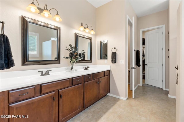 921 N Soliz St, Dewey-Humboldt, AZ 86327 - full bath featuring double vanity, baseboards, and tile patterned floors
