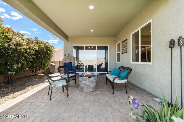 921 N Soliz St, Dewey-Humboldt, AZ 86327 - view of patio featuring an outdoor fire pit