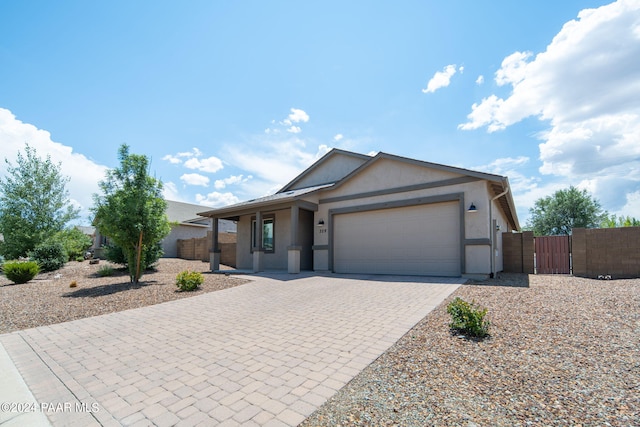 ranch-style home with a garage