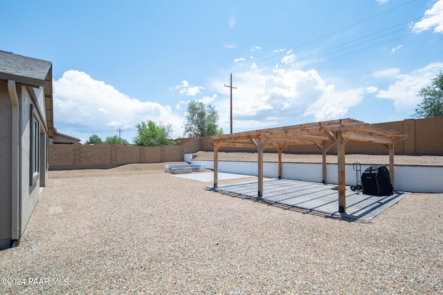 exterior space featuring a pergola and a patio