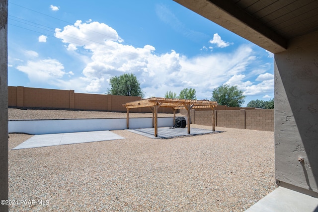 view of yard featuring a pergola and a patio