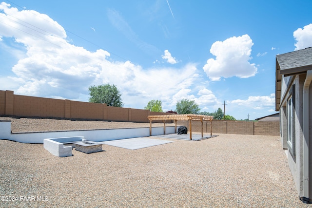 view of swimming pool with a pergola and a patio