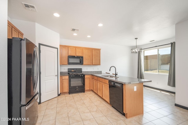 kitchen with black appliances, sink, decorative light fixtures, kitchen peninsula, and a chandelier