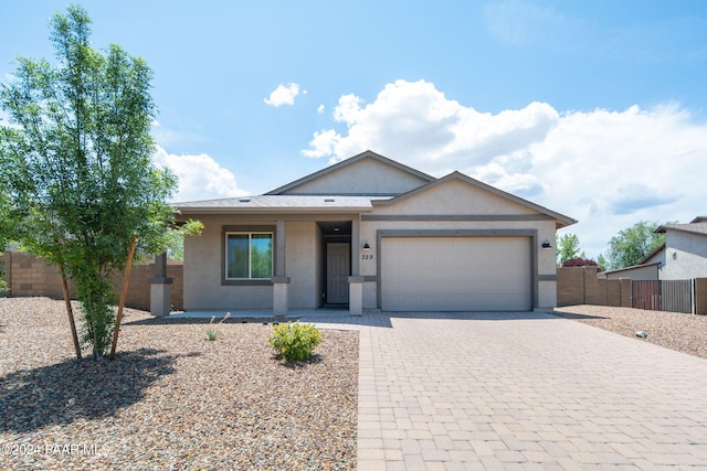 ranch-style home with a garage