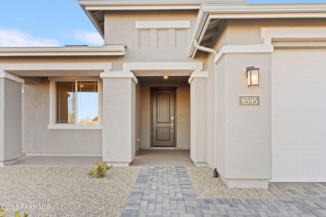 property entrance with a garage