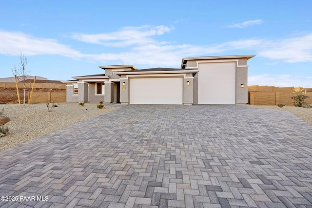 prairie-style home with a garage