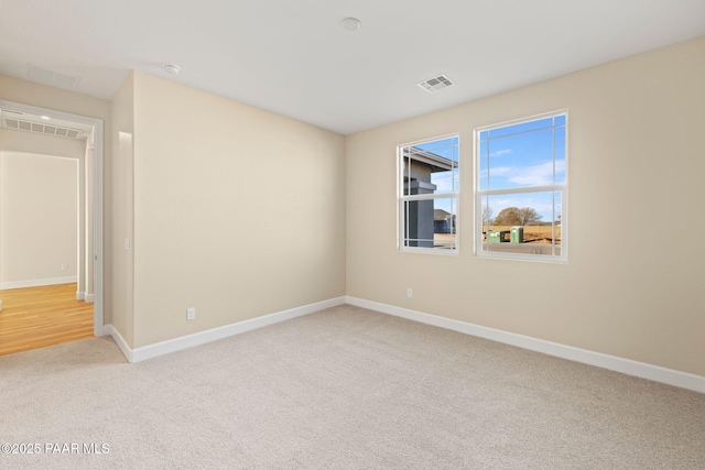 view of carpeted spare room