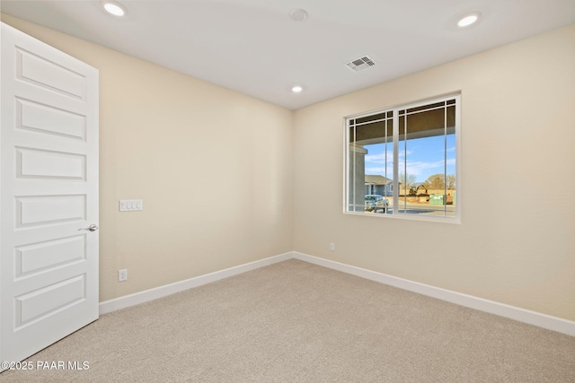 unfurnished room with carpet floors